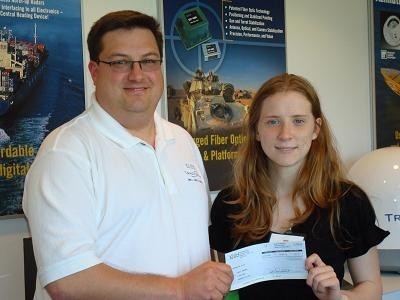 2008 TECH SCHOLAR Samantha Sinapi, right, a recent graduate of Portsmouth High School, accepts the scholarship from KVH Marketing Manager Chris Watson. / 2008 TECH SCHOLAR Samantha Sinapi, right, a recent graduate of Portsmouth High School, accepts the scholarship from KVH Marketing Manager Chris Watson. /