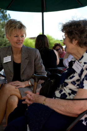 Honoree Laura Adams(l), RI Quality Institute, chats with a friend during the cocktail reception. / PBN Photo/Stephanie Ewens