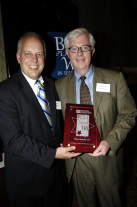 PBN Publisher Roger Bergenheim(l) presents Neil McNamara, of Nixon Peabody, with their award for wining in the Small Category.  / PBN Photo/Frank Mullin