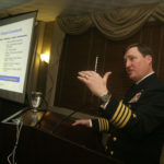 Navy breaks ground for Supply Corps School DISCUSSING the planned expansion of Naval Station Newport during a February 2008 presentation is Capt. Michel T. Poirier, the base commander. (READ MORE) /