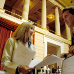 AT THE ASSEMBLY: Representatives Amy G. Rice (D-Portsmouth) and Frank G. Ferri (D-Warwick) confer in the House Chamber last week. / 