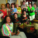 Providence Mutual fire insurance co.&rsquo;s staff, shown above, receives perks such as Hawaiian shirt day and Narragansett Bay cruises. / 