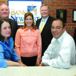 The Adminstration at BankNewport makes efforts to reward top-performing 
employees said Vice President Nelson Texeira, front row, right. / 