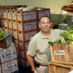 ERIC PELSER, sales manager for Community Fruitland Inc., said that local colleges, including Providence College and Salve Regina University, have been looking for produce supplies. / 