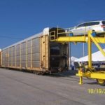 THE PORT OF DAVISVILLE currently receives foreign cars via cargo ship, but domestic vehicles are also carried in and out by train. / 