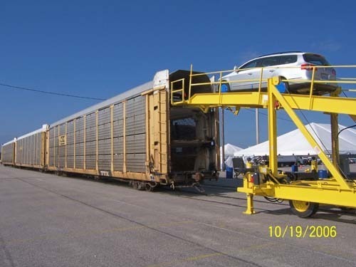 THE PORT OF DAVISVILLE currently receives foreign cars via cargo ship, but domestic vehicles are also carried in and out by train. / THE PORT OF DAVISVILLE currently receives foreign cars via cargo ship, but domestic vehicles are also carried in and out by train. /