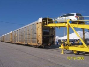 THE PORT OF DAVISVILLE currently receives foreign cars via cargo ship, but domestic cars are also carried in and out by train. / PHOTO COURTESY OF QDC