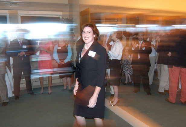 Erin Plaziak, of MetLife Auto &amp; Home, as she accepts her 40 Under Forty award. / PBN Photo/Frank Mullin
