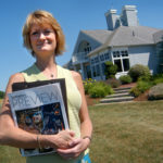 High-end homes still find buyers LIZ TABER, a broker/manager for Gustave White Sotheby’s International Realty, in front of a recently purchased seaside home in Bristol. /