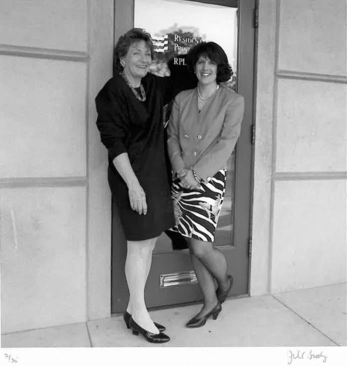 RESIDENTIAL PROPERTIES Ltd. founders Liz Chace, left, and Sally Lapides in 1986 in front of the landmark building on the corner of Benefit and Wickenden Streets.  / 