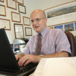 Despite barriers, e-prescriptions gaining following DR. YUL EJNES fills patients’ prescriptions online using the SureScripts’ national e-prescribing network. /
