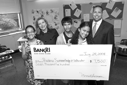 FROM LEFT: Dulari Tahbildar, Summerbridge executive director; Patricia Saracino, BankRI vice president of community relations; Allen Tat and Shaynah Ferreira, Summerbridge students; and Manny Barrows, BankRI senior vice president of business lending. / FROM LEFT: Dulari Tahbildar, Summerbridge executive director; Patricia Saracino, BankRI vice president of community relations; Allen Tat and Shaynah Ferreira, Summerbridge students; and Manny Barrows, BankRI senior vice president of business lending. /