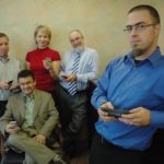Fulfilling the promise of mobile technology GYPSII TAKES ADVANTAGE of the capabilities of mobile devices – phones, Blackberries, etc. – to help people connect. Showing devices that run the software are GyPSii staffers, from left, Shane Lennon, Oksana Allman, Jack Early, Joshua Gigantino and Richard Pizzarro, seated. /