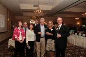 Excited guests from Hasbro, Inc., a Tech Laureate honoree for Outstanding Partner, gather to pose for a photo during the cocktail reception. / PBN Photo