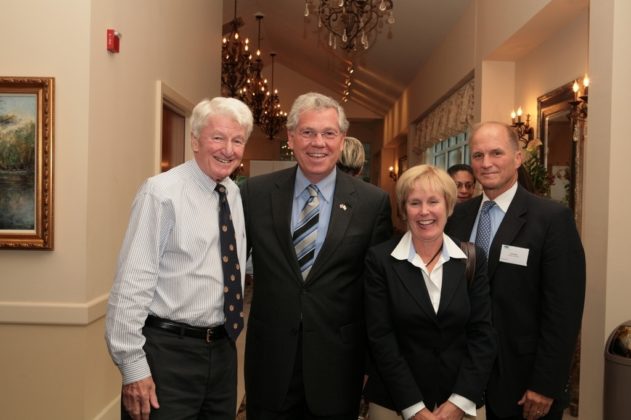 Governor Carcieri (2nd from left) and Dick Spies(r), of Brown University, mingle and chat with Janet Raymond and Paul DeRoche(l), both of the Greater Providence Chamber of Commerce, before the awards ceremony. / PBN Photo