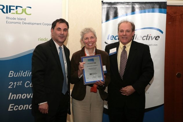 Elizabeth Pierotti, of The Inventing Life, as she accepts her award as an Innovation Champion. / PBN Photo