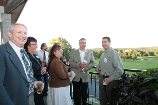 The lush green landscape of Kirkbrae Country Club serves as a perfect backdrop for guests enjoying the event's cocktail reception. / PBN Photo