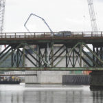 BRIDGING THE GAP: The Brightman Street Bridge, currently being replaced, connects Somerset and Fall River. / 