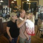 BREWING ON UP: Seven Stars owners Lynn and Jim Williams, shown with their 4-year-old daughter, Ceci, recently opened a new caf&eacute; on Broadway in Providence and has a Hope Street location and a production facility in Pawtucket. / 