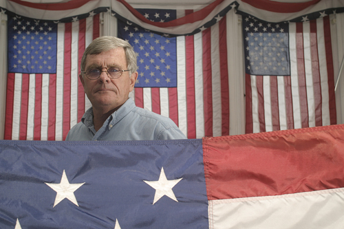 PLEDGING ALLEGIANCE: In the era of big-box retailers, Atlantic Flag & Banner owner Les Haworth is an anomaly – someone who sells American flags made in the U.S. / PLEDGING ALLEGIANCE: In the era of big-box retailers, Atlantic Flag & Banner owner Les Haworth is an anomaly – someone who sells American flags made in the U.S. /
