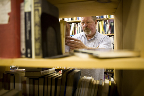 WRITING ON THE WALL: Cellar Stories owner Michael Chandley says the future for books appears bright, based on the number of young people who visit his Mathewson Street shop in Providence. / WRITING ON THE WALL: Cellar Stories owner Michael Chandley says the future for books appears bright, based on the number of young people who visit his Mathewson Street shop in Providence. /