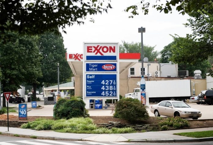 NATIONWIDE, gasoline prices tumbled to 34 cents over the past week to $3.169 per gallon, AAA found. The average local self-serve price today was $3.149 in both Rhode Island and Massachusetts. Above, an Exxon-Mobil station in Washington, D.C. / NATIONWIDE, gasoline prices tumbled to 34 cents over the past week to $3.169 per gallon, AAA found. The average local self-serve price today was $3.149 in both Rhode Island and Massachusetts. Above, an Exxon-Mobil station in Washington, D.C. /