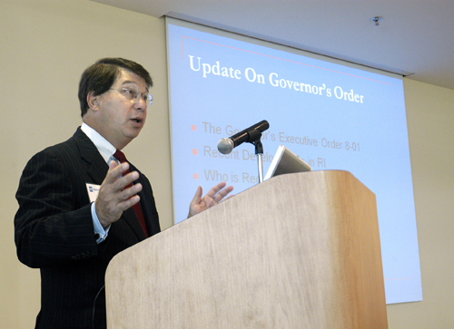 MICHAEL KRAEMER, a partner at Hinckley, Allen & Snyder, speaks to an audience about Gov. Donald L. Carcieri’s order on illegal immigrants and compliance with E-Verify. / MICHAEL KRAEMER, a partner at Hinckley, Allen & Snyder, speaks to an audience about Gov. Donald L. Carcieri’s order on illegal immigrants and compliance with E-Verify. /