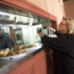 THE RIGHT INGREDIENTS: LJ’s BBQ owners Linda and Bernie Watson work in their Pawtucket restaurant, with Bernie cooking and Linda running orders. / 