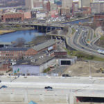 ABOUT 19 ACRES on the west side of the Providence River will be freed up for development after part of I-195 is removed for the Iway project, shown in the foreground. / 