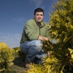 HARVESTING THE FUTURE: Rhode Island Nurseries General Manager Jesse Rodrigues says a pond built with federal money will help with potential water needs. / 