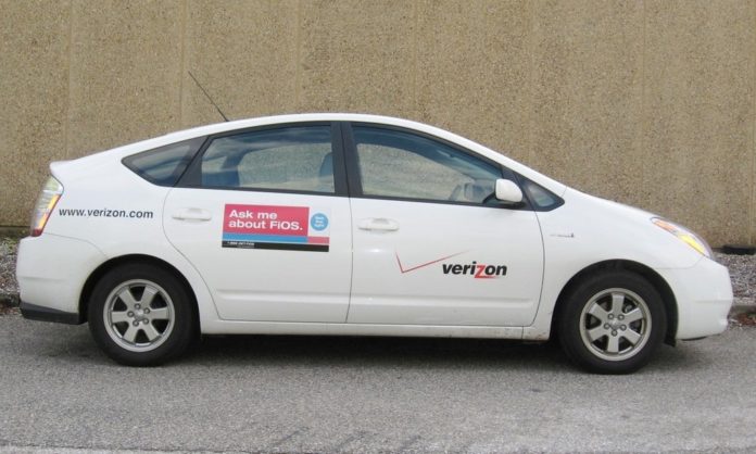 VERIZON BEGAN REPLACING its gasoline-powered cars with Toyota Prius hybrid sedans like this one late last year. / VERIZON BEGAN REPLACING its gasoline-powered cars with Toyota Prius hybrid sedans like this one late last year. /