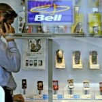 THE SALE of BCE to investors including Providence Equity was intended to take the Bell Canada parent private. Above, sales rep Ryan Sammut talks on the phone in a Bell Canada wireless store in Toronto. / 