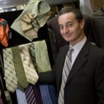 SNAPPY DRESS: Spardello's Clothiers owner John Broccoli remains optimistic that holiday shoppers will come out to buy despite bleak predictions. / 