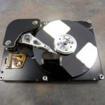 A HARD DRIVE containing an arm created at Technical Materials Inc. in Lincoln, one of the manufacturers toured by the House Finance Committee last month. / 