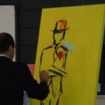 Artist donates work to Butler, starts art classes JEFFREY M. SPARR paints "The Peace Man" before a live audience Nov. 19. /