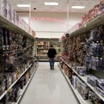 PERSONAL SPENDING fell at a revised 3.8% annual rate in the third quarter that was even sharper than previously thought, the BEA said. Durable-goods sales fell fastest, as wary shoppers postponed big-ticket purchases. Above, a customer strolls the toy aisle at a Super Target in Thornton, Colo. / 