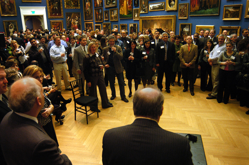 PBN Editor Mark Murphy welcomes the evening's attendees in the Museum's main gallery. / PBN Photo/Frank Mullin