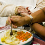 HELPING HANDS: Family members often help residents of the Tockwotton Home with daily tasks. / 