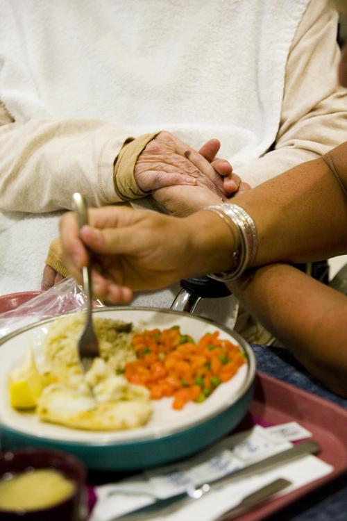 HELPING HANDS: Family members often help residents of the Tockwotton Home with daily tasks. / HELPING HANDS: Family members often help residents of the Tockwotton Home with daily tasks. /