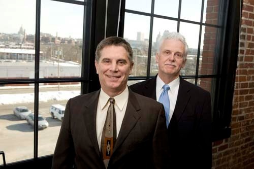ATTORNEY GARY R. PANNONE, of the firm Pannone Lopes & Devereaux, left, and John J. Padien III, CEO of the Arc of Blackstone Valley, in Pannone’s Providence office. The law firm will present quarterly seminars to the leaders of nonprofit organizations. / ATTORNEY GARY R. PANNONE, of the firm Pannone Lopes & Devereaux, left, and John J. Padien III, CEO of the Arc of Blackstone Valley, in Pannone’s Providence office. The law firm will present quarterly seminars to the leaders of nonprofit organizations. /