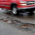 WHILE NOTING that long-term solution to improving road conditions is road repaving, Mayor David N. Cicilline also said that the quickest way to improve safety on roads in Providence is to patch the potholes throughout the city. / 
