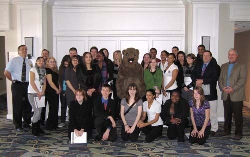 HELP WANTED: Students from William M. Davies Jr. Career & Technical High School in Lincoln pose with a groundhog at the kickoff of Junior Achievement Job Shadow Day at the Hyatt Regency Newport. / HELP WANTED: Students from William M. Davies Jr. Career & Technical High School in Lincoln pose with a groundhog at the kickoff of Junior Achievement Job Shadow Day at the Hyatt Regency Newport. /