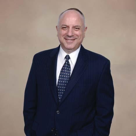 GEORGE A. VECCHIONE, president and CEO of the health care network, will see an effective cut of 26%, the memo said. It cited the raise he skipped on Jan. 1, the permanent benefit cuts he accepted Jan. 1 and a new reduction that trims his base pay by 10%. / GEORGE A. VECCHIONE, president and CEO of the health care network, will see an effective cut of 26%, the memo said. It cited the raise he skipped on Jan. 1, the permanent benefit cuts he accepted Jan. 1 and a new reduction that trims his base pay by 10%. /