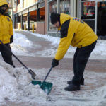 DID helps sell downtown through cleanup efforts CLEAN SLATE: Porfirio Lopez, left, and Fernando Matos work to clear ice and snow from the crosswalk at Weybosset and Mathewson streets last week. /