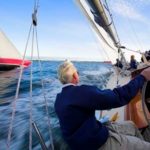 Sailing spurs bonding, competition FULL SAIL: Skipper George Hill, foreground, aboard Weatherly, during a team building corporate outing organized by America’s Cup Charters on Narragansett Bay. /