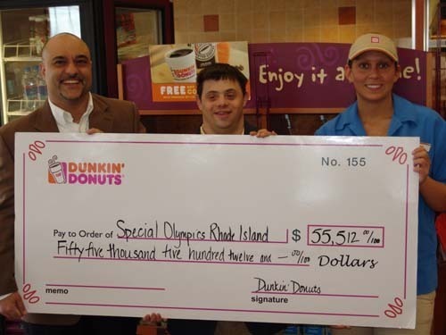 SPECIAL OCCASION: Rob Batista, left, Dunkin’ Donuts franchise owner, Michael Lucca, Special Olympics Rhode Island athlete and Lindsey Hakanson, Dunkin’ Donuts store manager. / SPECIAL OCCASION: Rob Batista, left, Dunkin’ Donuts franchise owner, Michael Lucca, Special Olympics Rhode Island athlete and Lindsey Hakanson, Dunkin’ Donuts store manager. /