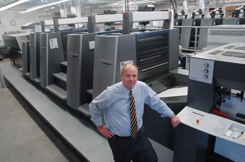INKING IT IN: John Nickson of OmniColor Printing markets plastic menus to restaurants looking to cut down on their waste. / INKING IT IN: John Nickson of OmniColor Printing markets plastic menus to restaurants looking to cut down on their waste. /