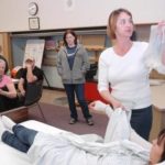 CCRI CNA STUDENTS watch as teacher Susan VonVillas discusses IVs at the R.I. Aquidneck Island Adult Learning Center. / 