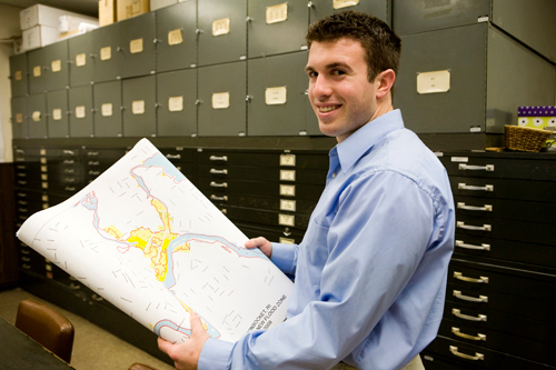 TESTING THE WATER: Benjamin Tavares, a civil engineer with the city of Woonsocket, says that about 300 parcels were added to a high-risk flood area as a result of FEMA’s revisions. / TESTING THE WATER: Benjamin Tavares, a civil engineer with the city of Woonsocket, says that about 300 parcels were added to a high-risk flood area as a result of FEMA’s revisions. /