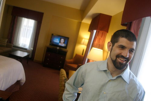 MAKING ROOM: Jeffrey T. Karam, vice president of First Bristol Corporation, shows off the new Hampton Inn & Suites Providence Downtown, which has a 1,200-square-foot function room on the top floor. / MAKING ROOM: Jeffrey T. Karam, vice president of First Bristol Corporation, shows off the new Hampton Inn & Suites Providence Downtown, which has a 1,200-square-foot function room on the top floor. /